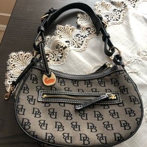 Used twice. DOONEY & BOURKE Black Purse small